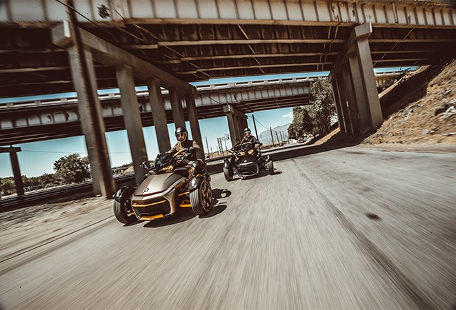 3 Can-Am Spyder vehicles on the open road 3 Can-Am Spyder vehicles on the open road